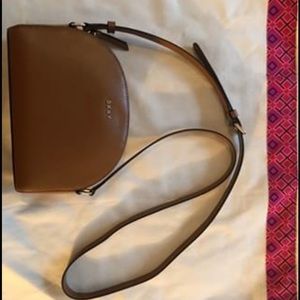 DKNY half moon crossbody bag.